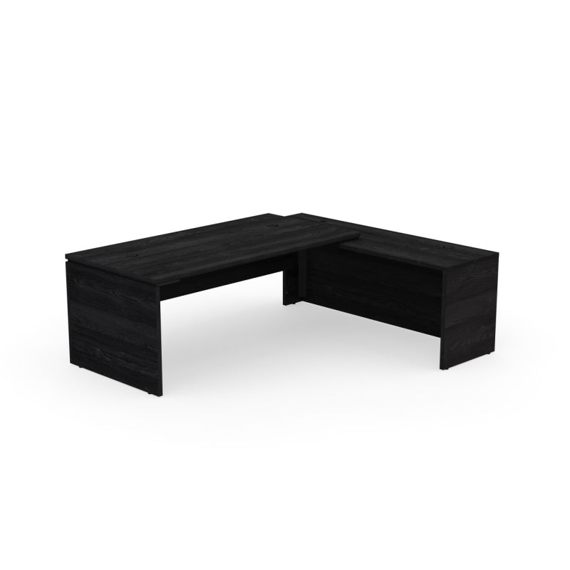Bureau de direction d'angle Kara finition Bois Noir avec panneau de retour positionné à droite.