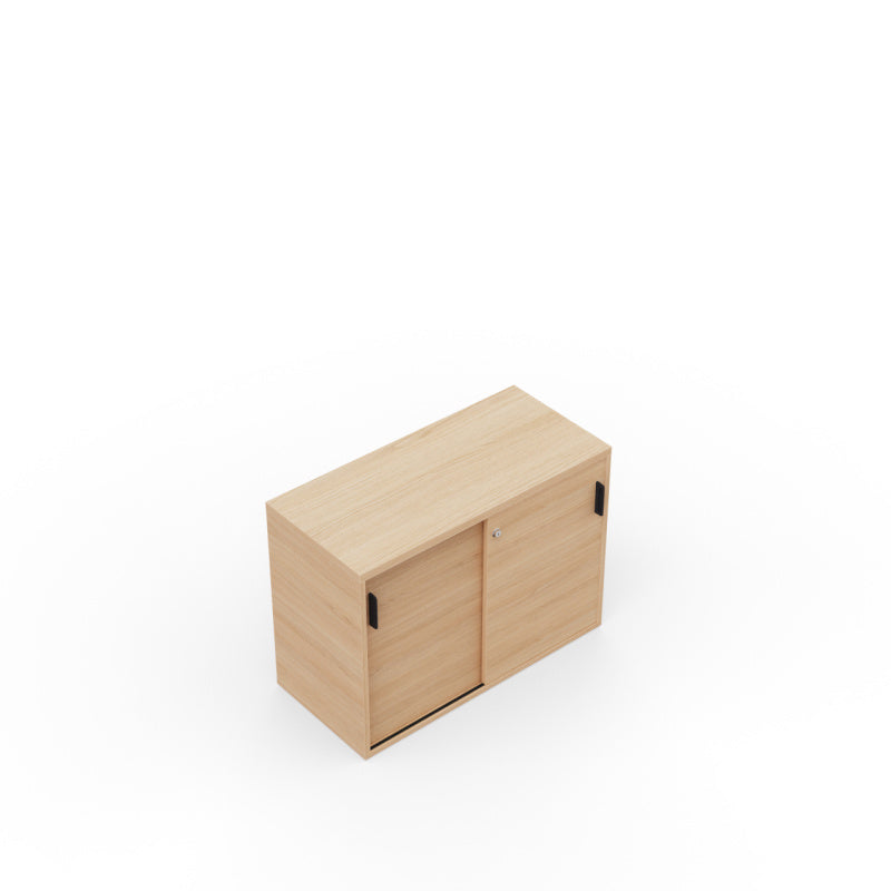 Kara Cupboard from EOL, measuring 73.5 cm tall, ideal for use as a compact credenza or lateral storage unit. Features two full-width sliding doors for entirely concealed office organization arial view 