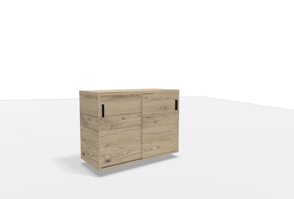 Kara Cupboard from EOL, measuring 73.5 cm tall, ideal for use as a compact credenza or lateral storage unit. Features two full-width sliding doors for entirely concealed office organization brunswick oak 