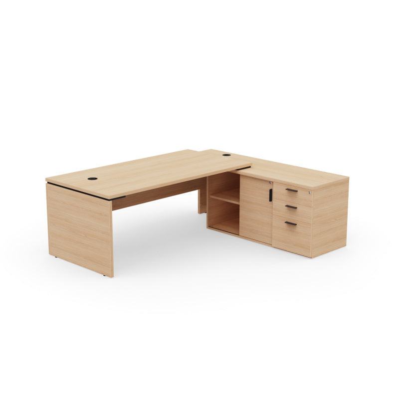 Kara Executive Desk from EOL featuring an integrated right side storage unit and a large work surface, creating a complete and highly organized L-shaped professional workstation. Natural oak.
