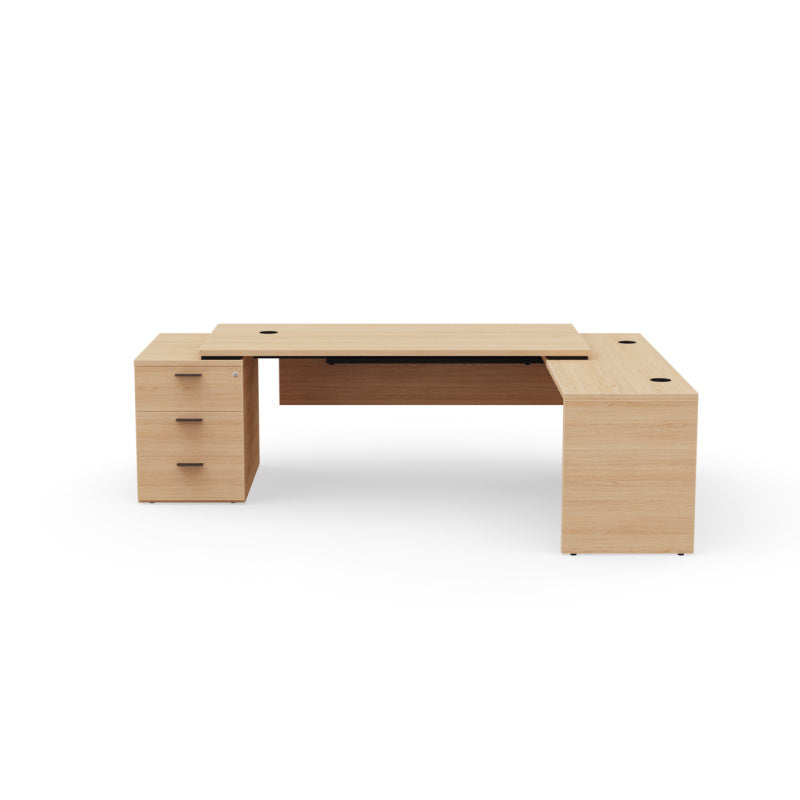 Kara Executive L-Shaped Desk (180x90 cm) with 3-drawer locking pedestal, extended return panel, and integrated power/USB cable management, available in various wood finishes. Back view. 