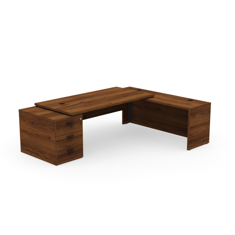 Kara Executive L-Shaped Desk (180x90 cm) with 3-drawer locking pedestal, extended return panel on the right side, and integrated power/USB cable management, available in various wood finishes. Dark walnut.