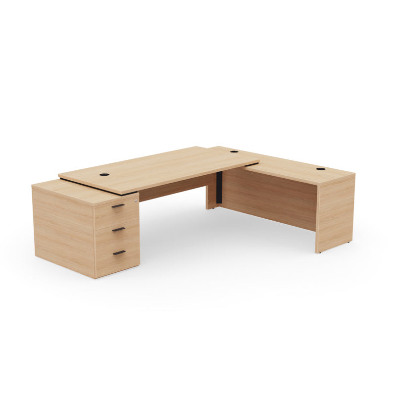 Kara Executive L-Shaped Desk (180x90 cm) with 3-drawer locking pedestal, extended return panel on the right side, and integrated power/USB cable management, available in various wood finishes. Natural oak.