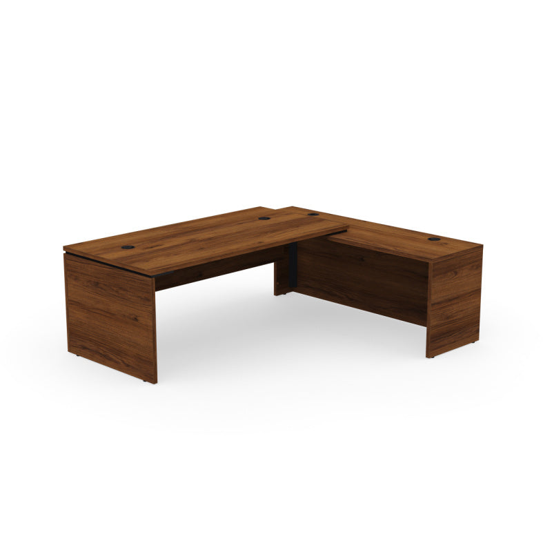 Kara Executive L-Shaped Desk (180x90 cm) with extended return panel on the right side, featuring durable melamine construction and superior integrated power/USB cable management for a streamlined professional office. Dark walnut.