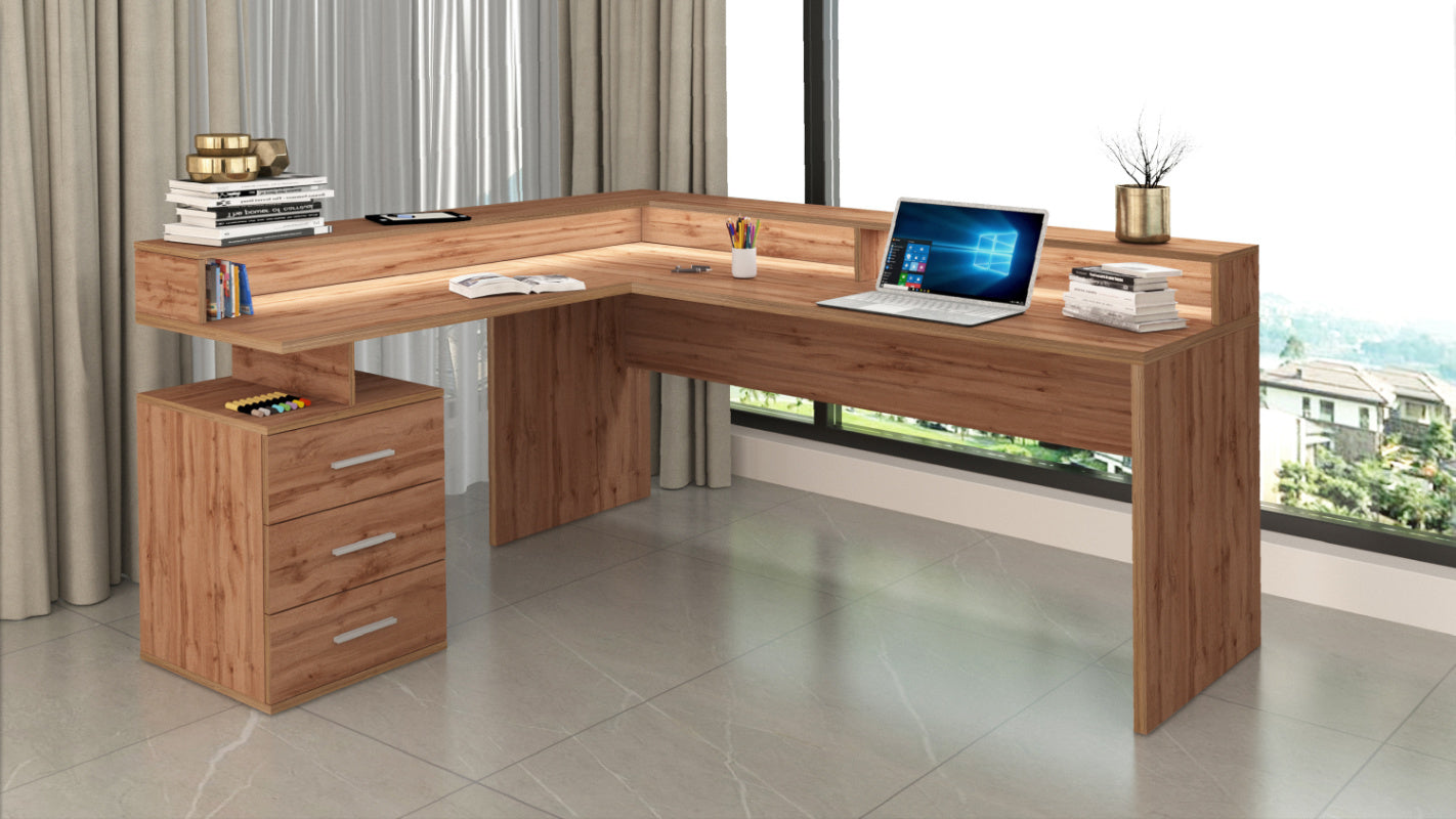 NEW SELINA Corner Desk by Web Furniture. This space-efficient desk is designed to fit into corners and includes an elevated monitor stand for improved ergonomics and desktop organization. Wotan oak.